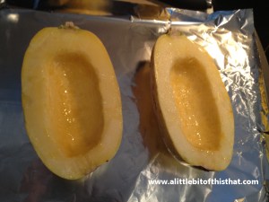Seeds are scooped out, squash is face side up, brushed with olive oil and some salt. :-)